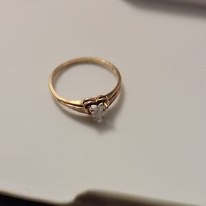 Elegant Gold Ring with Clear Stone
